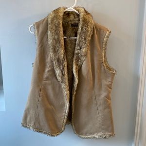 Deer skin, fur lined, vest